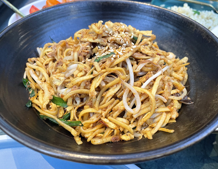 Hand-pulled noodles with three types of mushrooms.