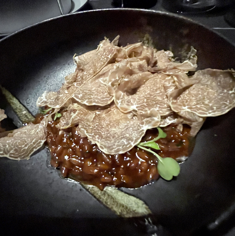 Red-wine risotto with white truffles.