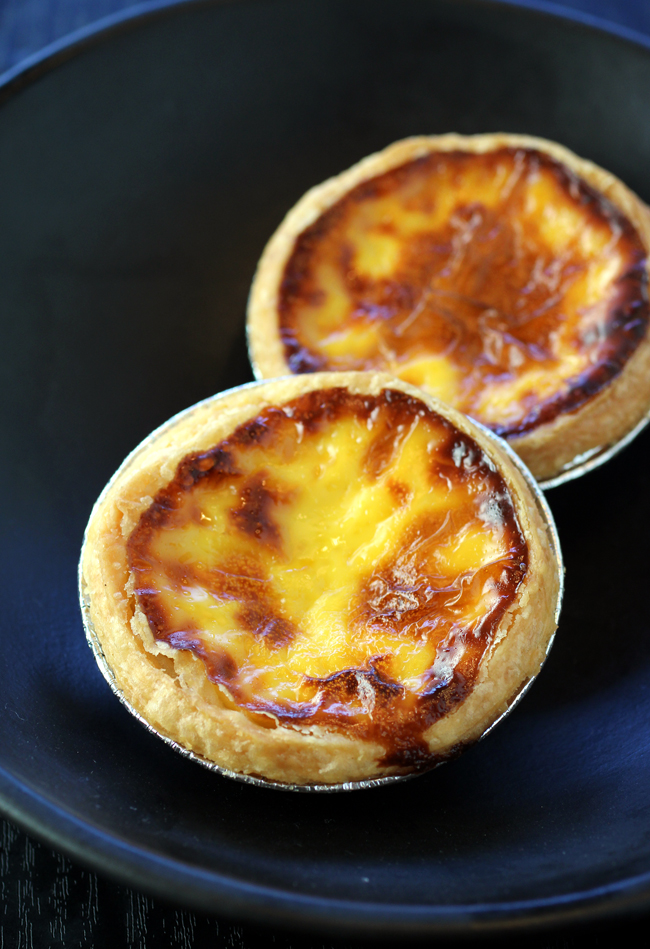 Two egg custard tarts come in an order.
