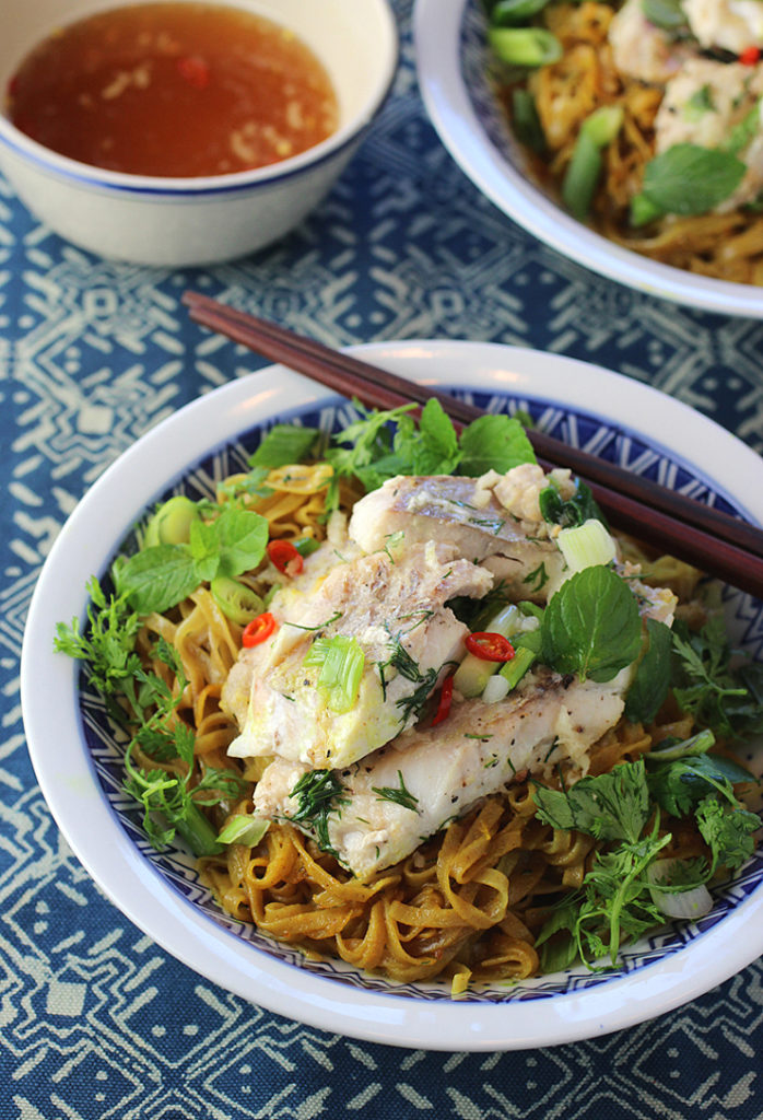 A tangle of rice noodles, a mound of tender fish, and a zesty-spicy Asian sauce make this an unforgettable dish.