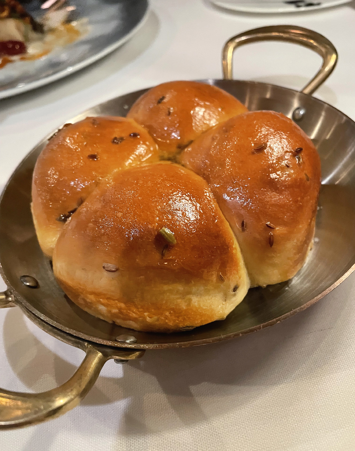 Milk bread rolls flavored with a touch of fennel seeds.