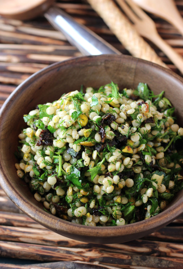 An easy, delightful pearl couscous salad with orange zest and prunes.