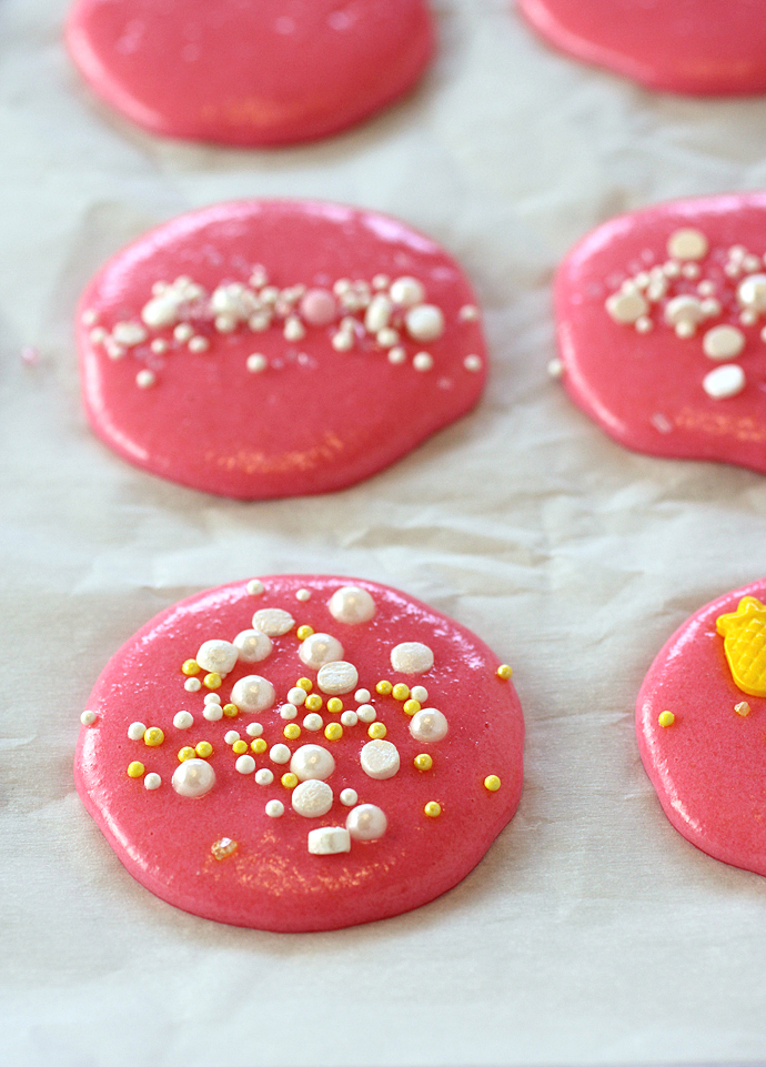 The just-piped macaron shells that will air-dry before baking.