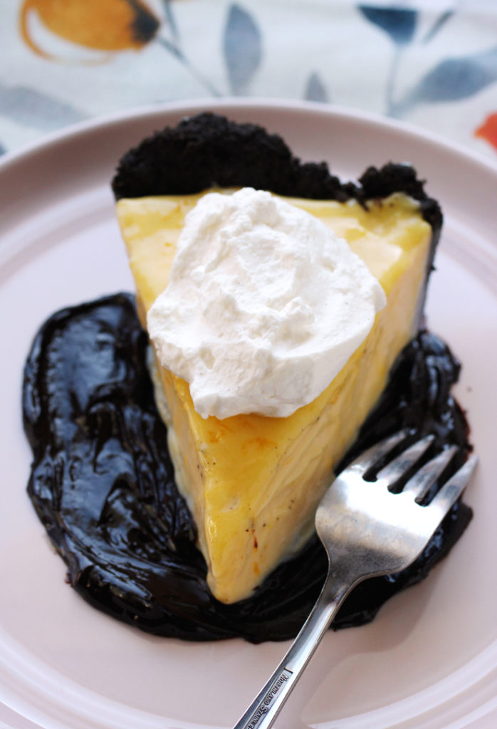 Two different layers of lemony goodness, plus hot fudge sauce, and  vanilla-scented whipped cream, make for one outrageously good pie.