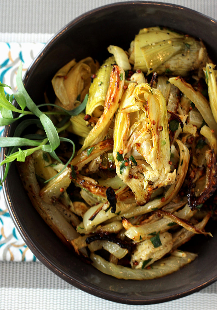 Canned artichoke hearts get revived in a glorious way in this simple recipe.