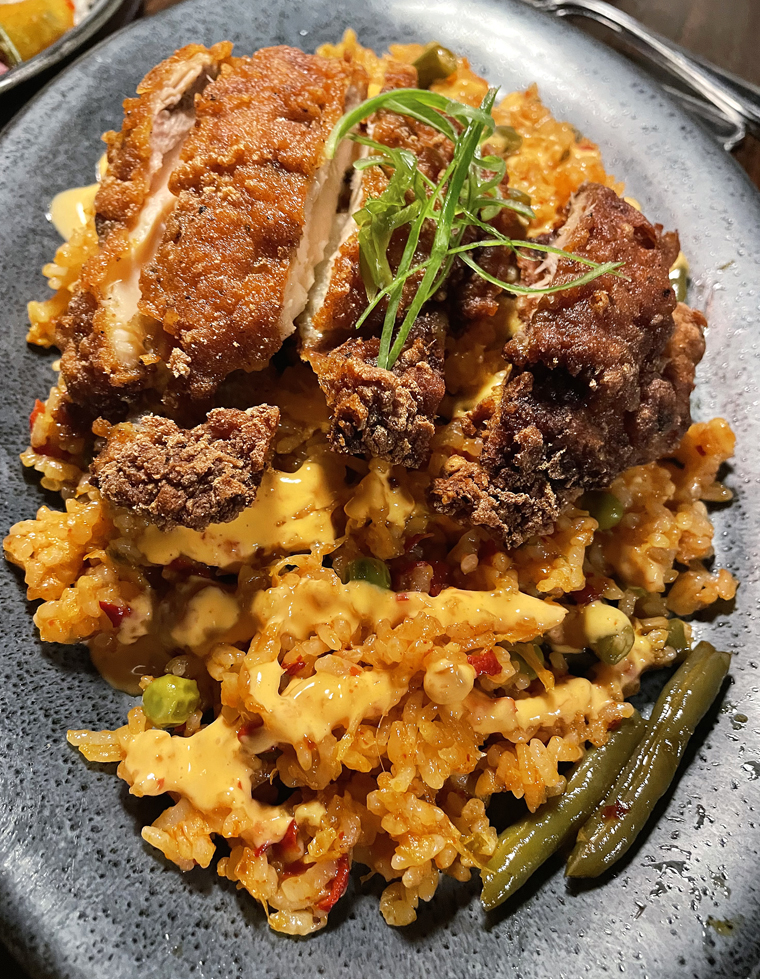 Two faves on one platter: kimchi fried rice and fried chicken.