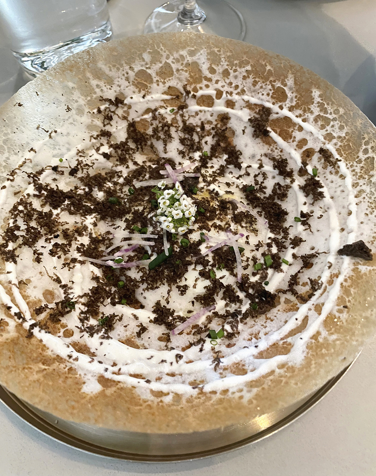 Egg appam with black truffle.