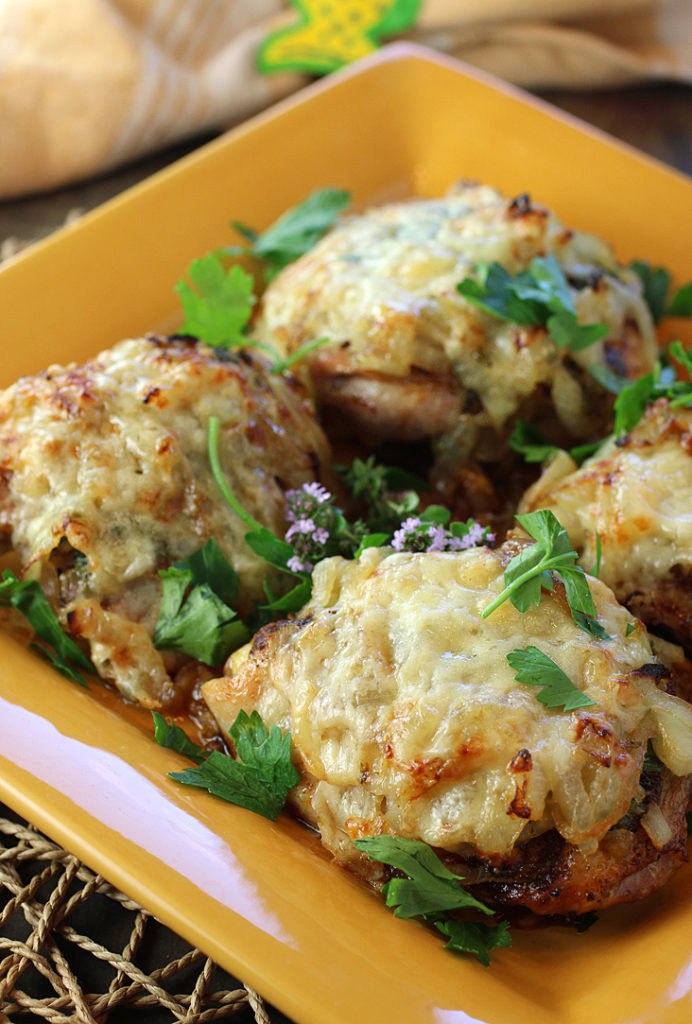 Chicken thighs smothered in caramelized onions and Gruyere just like classic French onion soup.