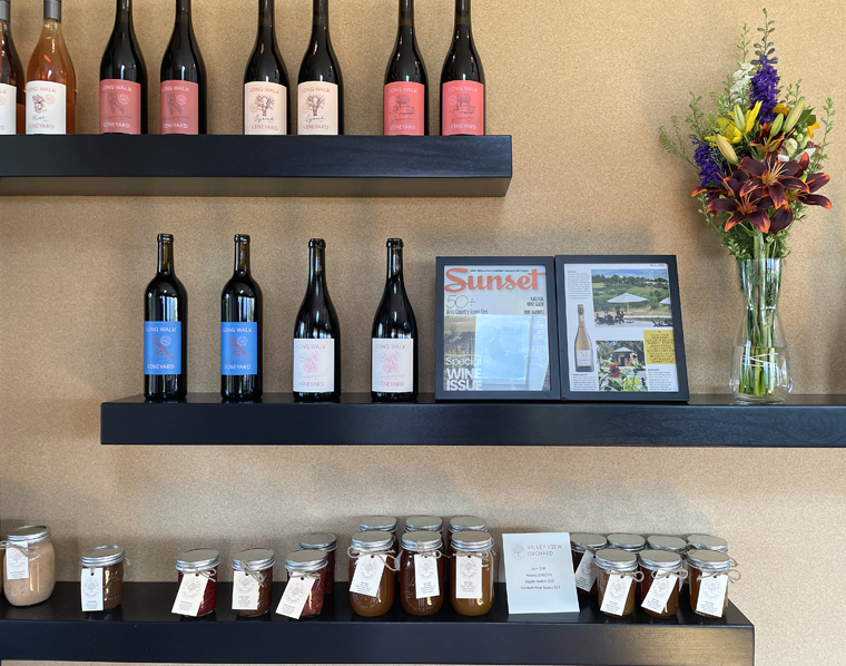 A display of wines and gourmet preserves.