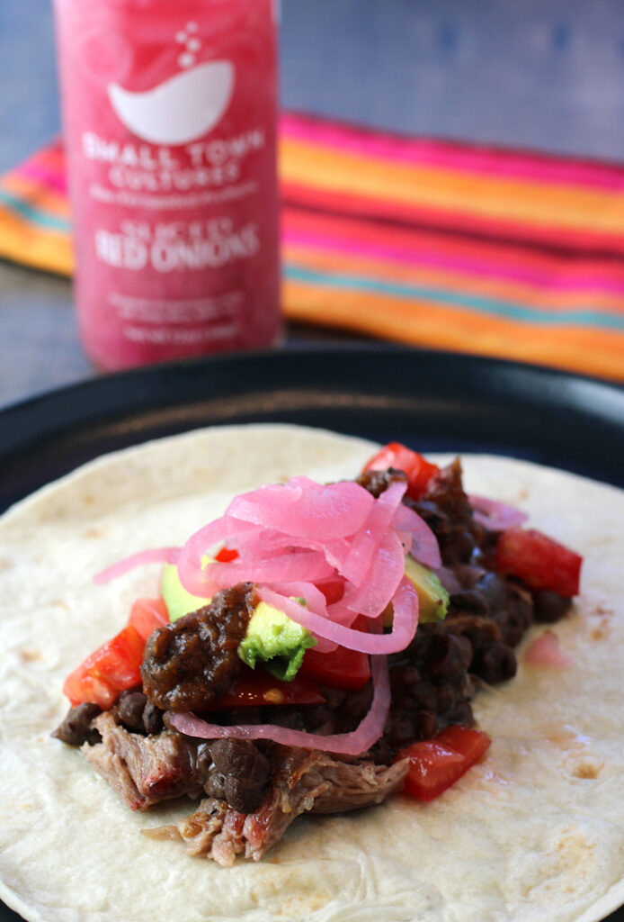 Small Town Cultures Sliced Red Onions are perfect on homemade pork burritos, and so many other dishes.