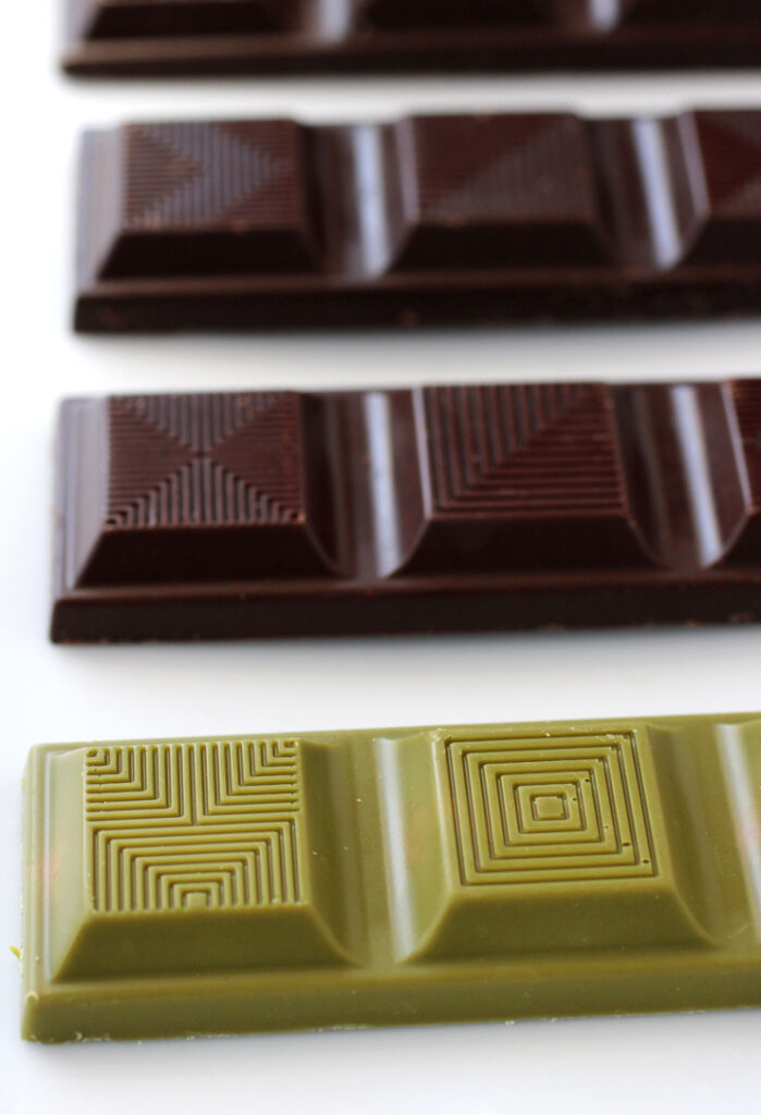 TCHO chocolate bars (front to back): The Perfect Matcha, Grizzly Berry, Deep, Dark & Salty, and Hoppy Hour.