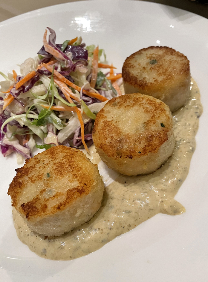 Crab cakes with apple slaw.