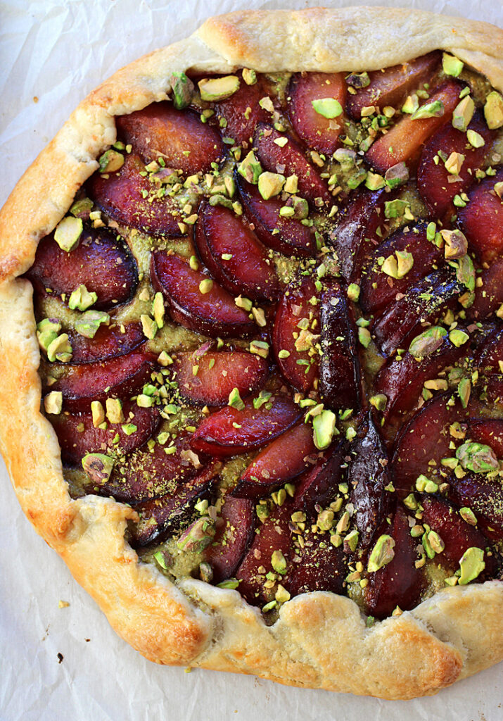 Summer plums and homemade pistachio frangipane are front and center in this delightful galette.