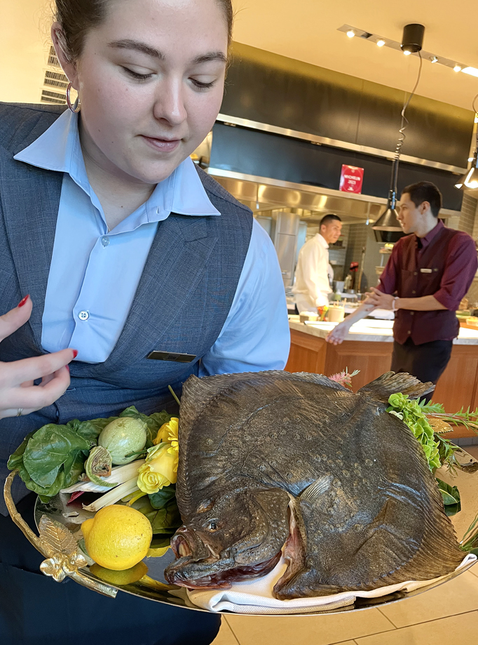 The whole turbot being shown.
