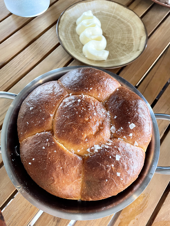 Parker House rolls come standard with cultured butter. For another $3, you can add herby whipped mascarpone.