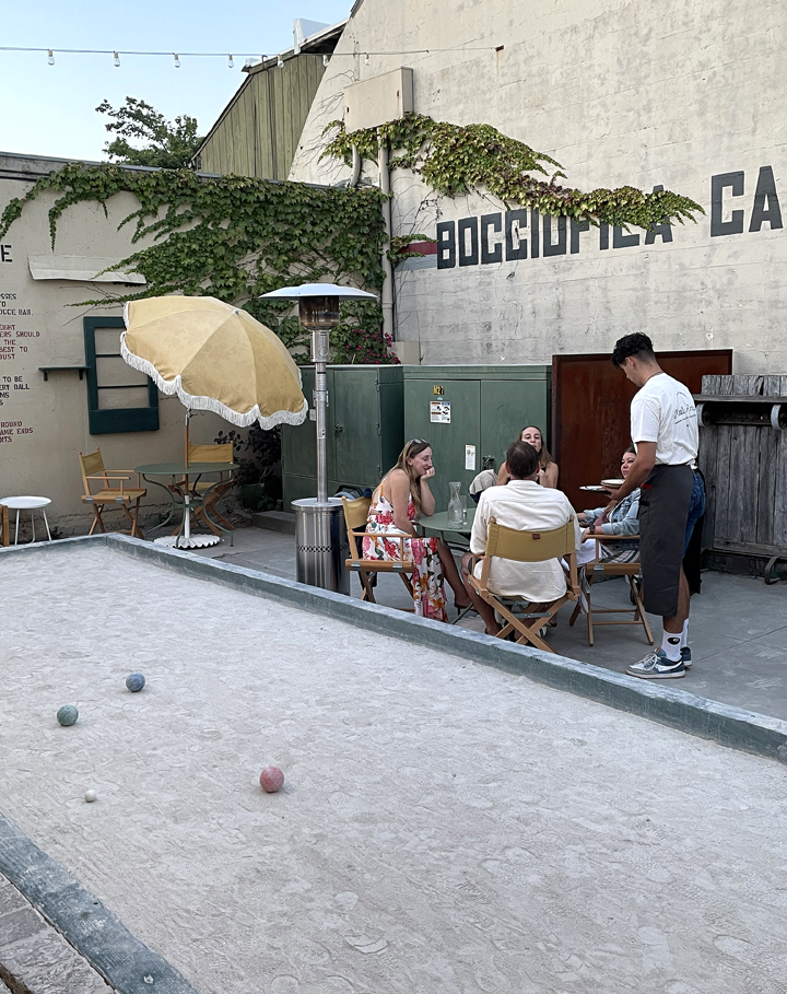The bocce ball court.