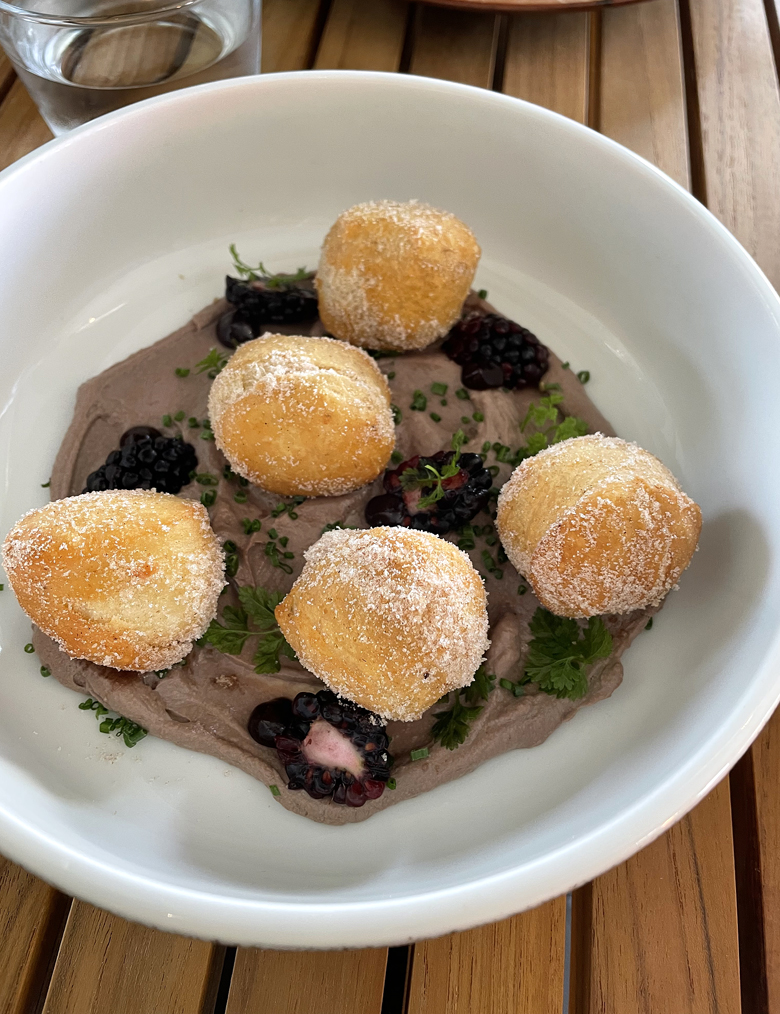 The unique chicken liver mousse with banana bread doughnuts at Sekoya.