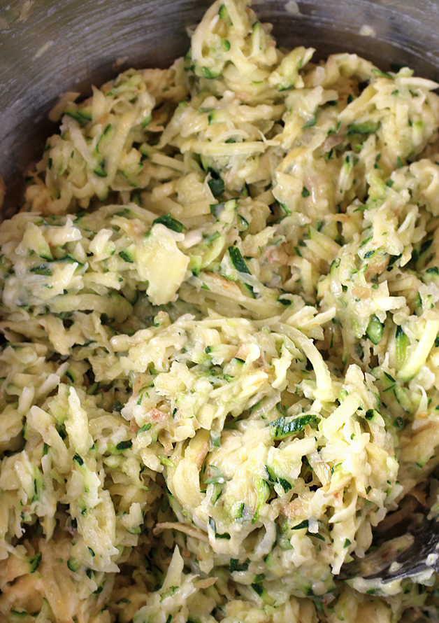 The grated potatoes and zucchini mixed with eggs, flour and baking powder.