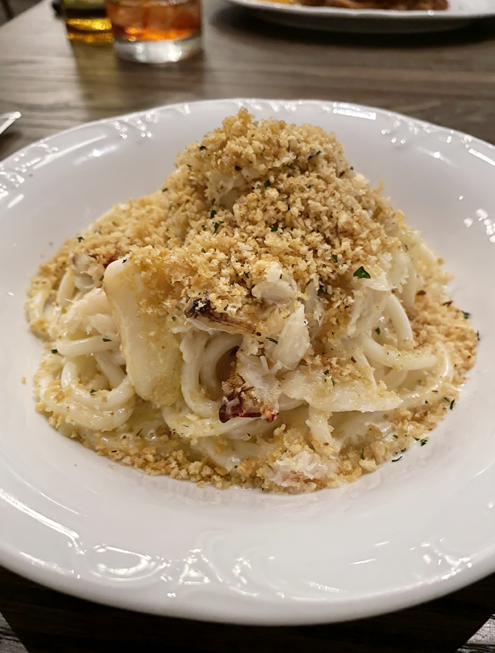 Spaghetti limon with Dungeness crab and toasted bread crumbs.