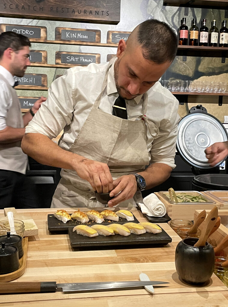 Chef de Cuisine Willer Larreal Perez presides over the 10-seat Sushi by Scratch inside The Matheson.