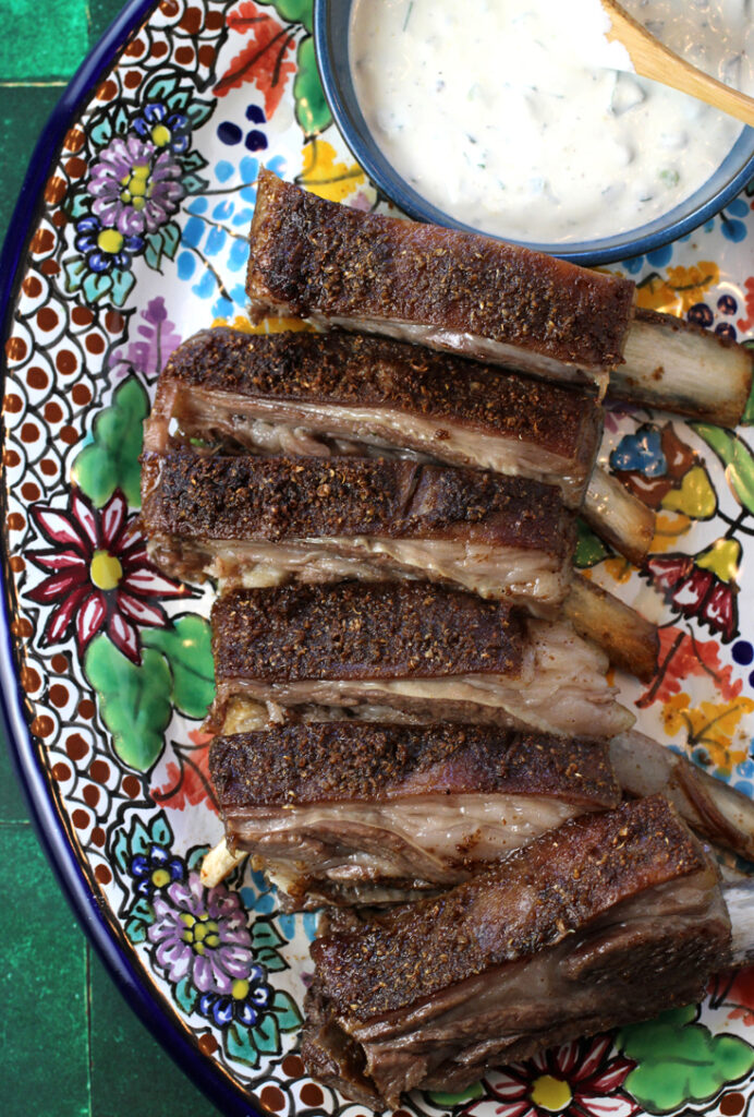 Sink your teeth into juicy lamb ribs flavored with warm spices.
