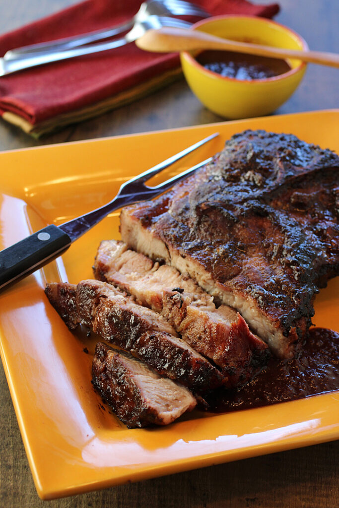 Juicy and so very tender, these bountiful pork butt steaks get glazed with a Dr. Pepper -- yes! -- cherry barbecue sauce.