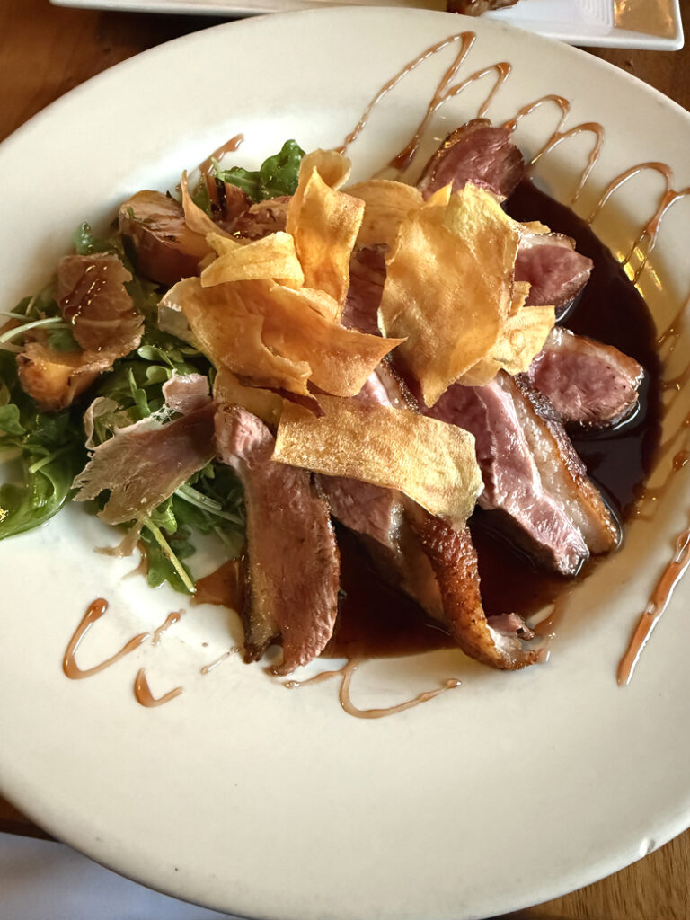 Pan-seared duck breast with sweet potato chips at the MacCallum House Restaurant.