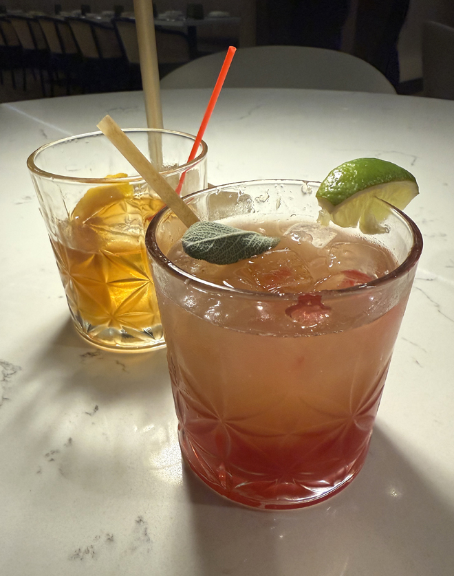 The Vrindavan Bloom (front) and Sands of Time (back) cocktails.