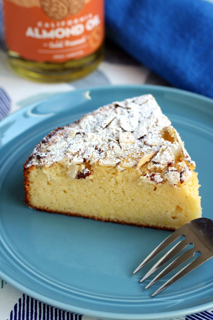 Almond oil, almond flour, almond extract, and sliced almonds combine in this winning cake.