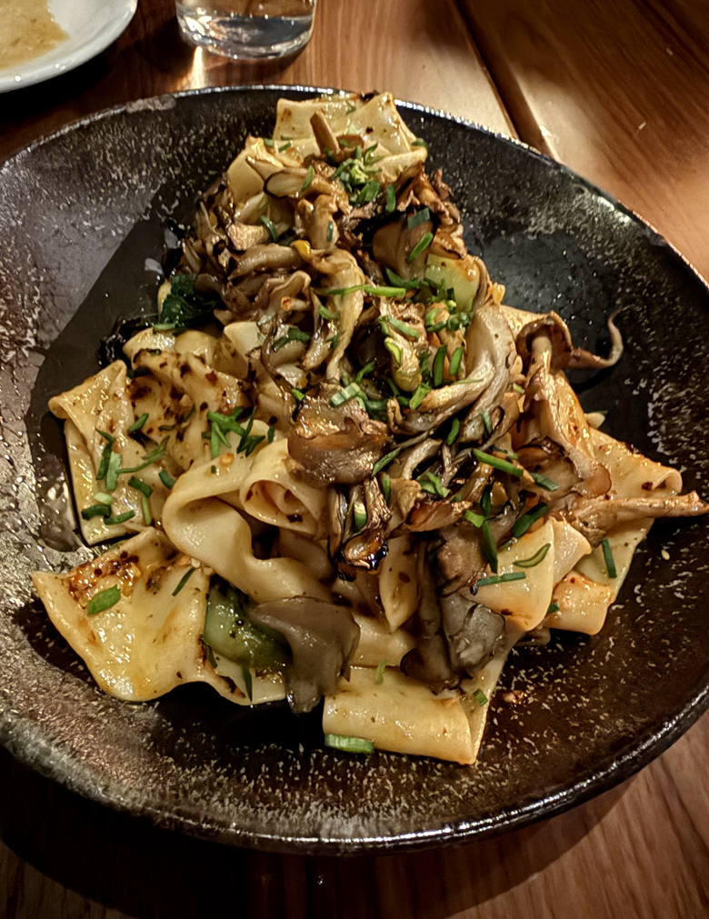 Hand-pulled noodles with hedgehog and shiitake mushrooms at Happy Crane.