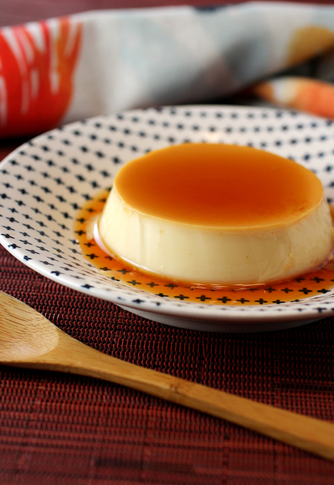 The pudding unmolds easily with a pool of caramel sauce cascading over it.