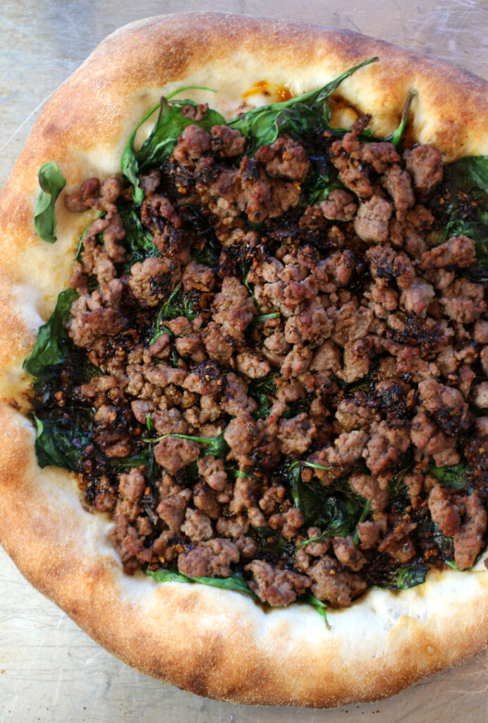 Fragrant and irresistible lamb pizza, made even better with cumin.