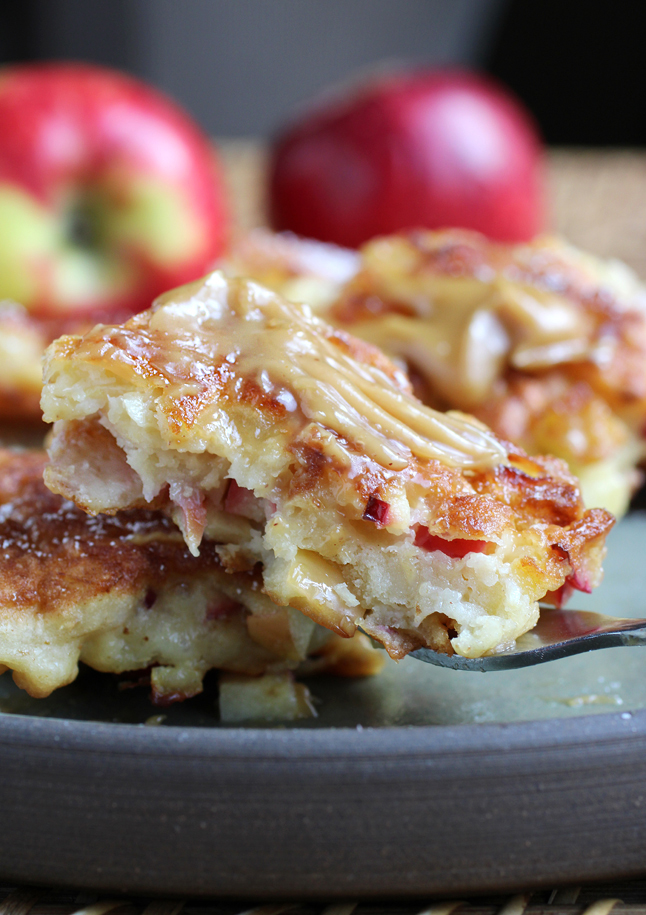 The flecks of red are the apple skin.