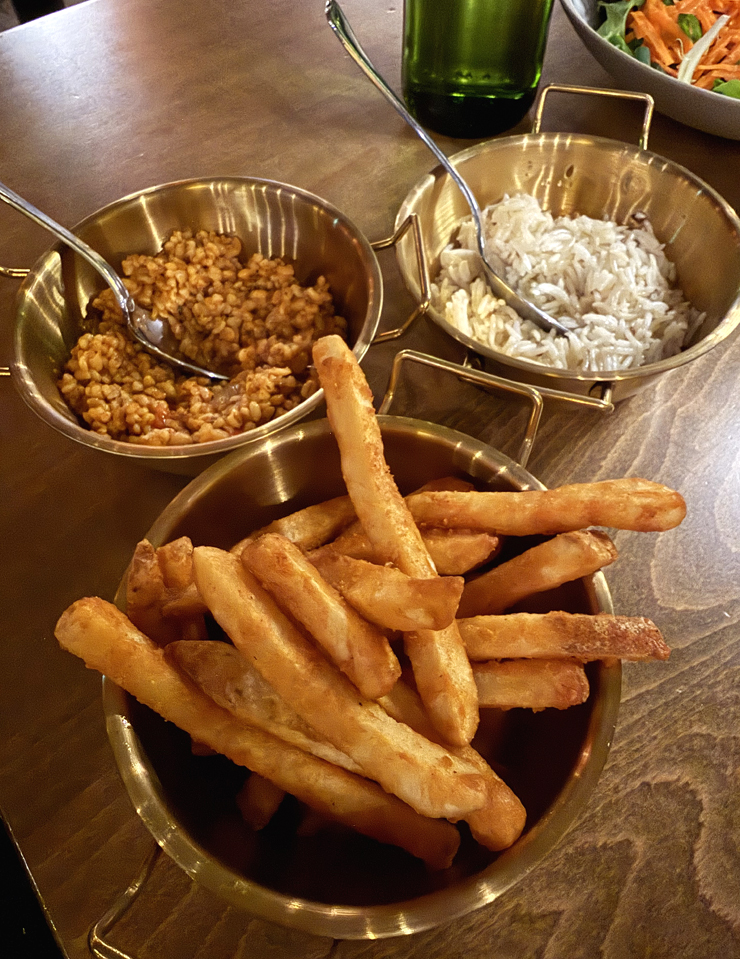 Seasoned fries and two types of rice.