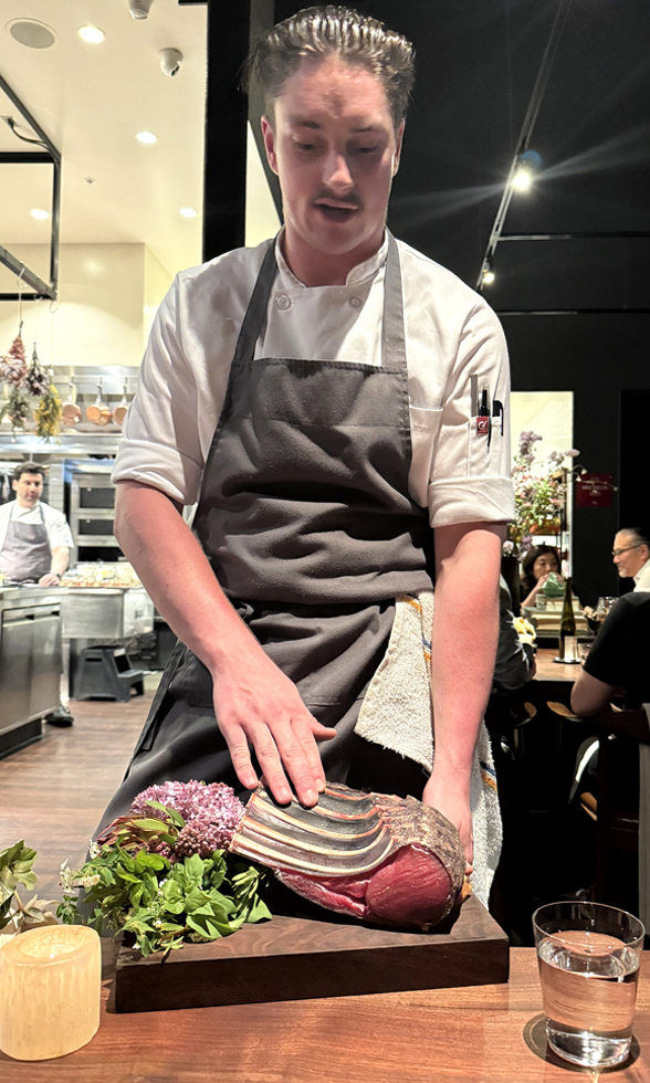 Aged antelope loin presented at the table.