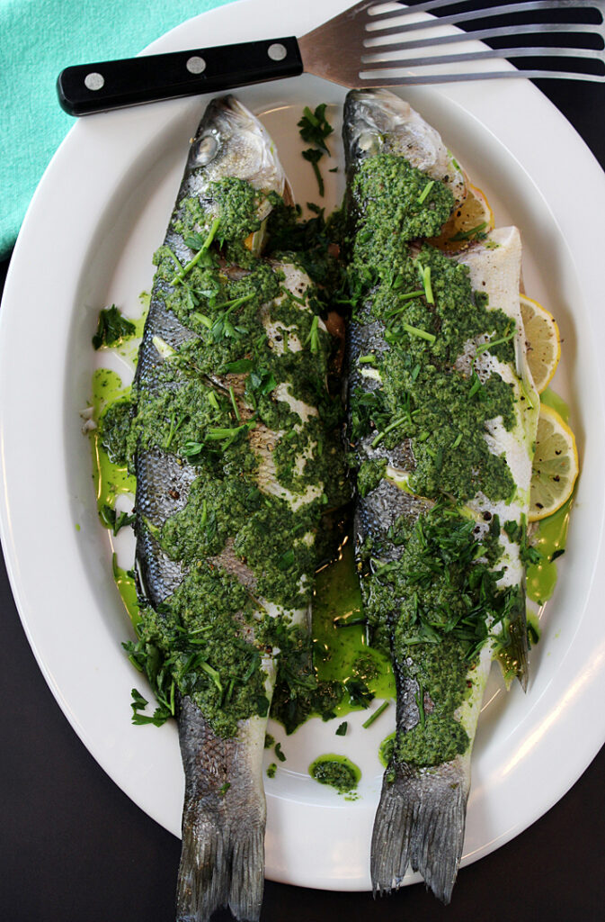Good-for-you roasted branzino gets a little indulgent when finished with a delicious green anchovy butter.