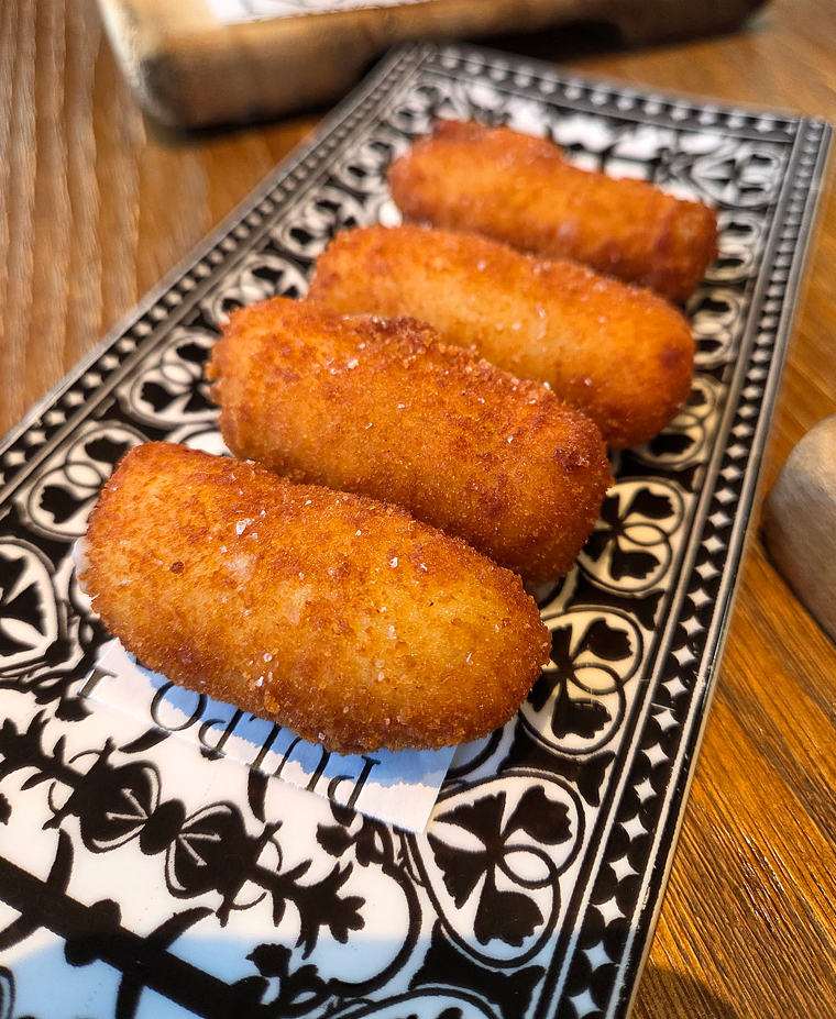 Chicken bechamel croquetas.
