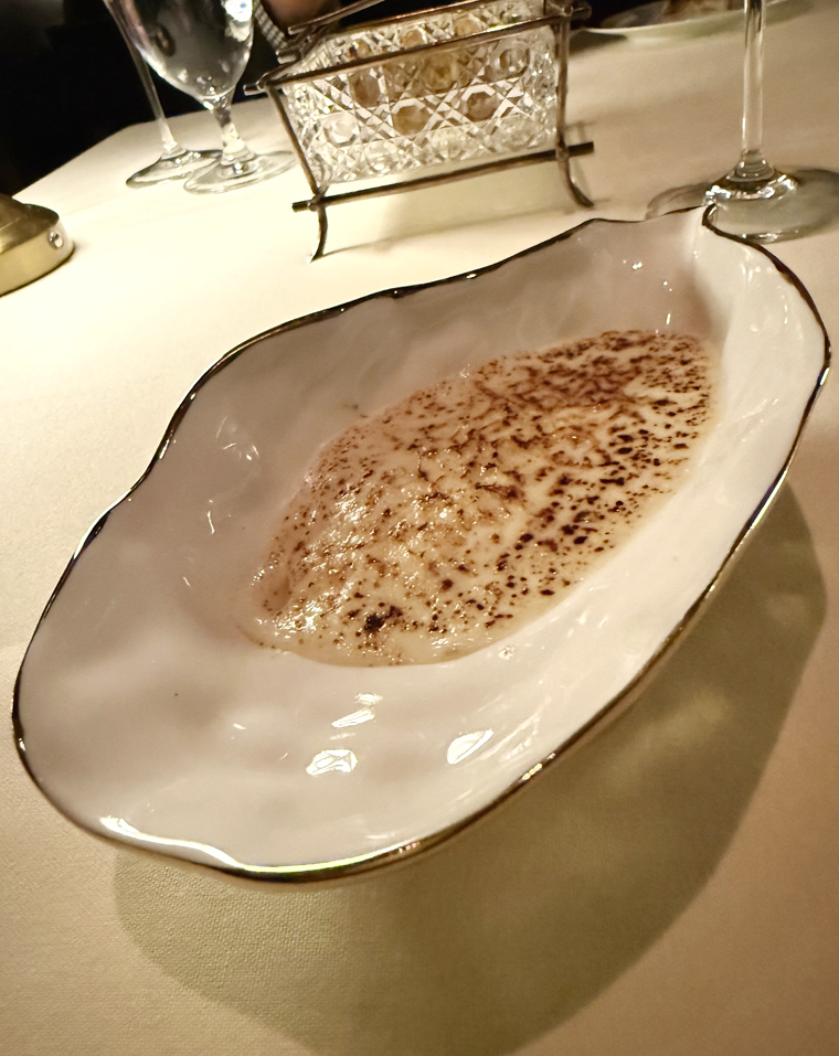 "Oysters Rockefeller'' in an oyster-shaped ceramic.