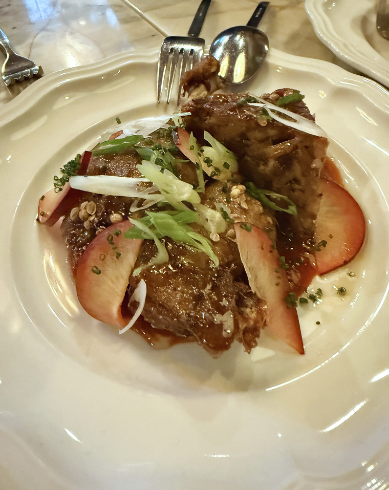 Duck confit with summer plums.