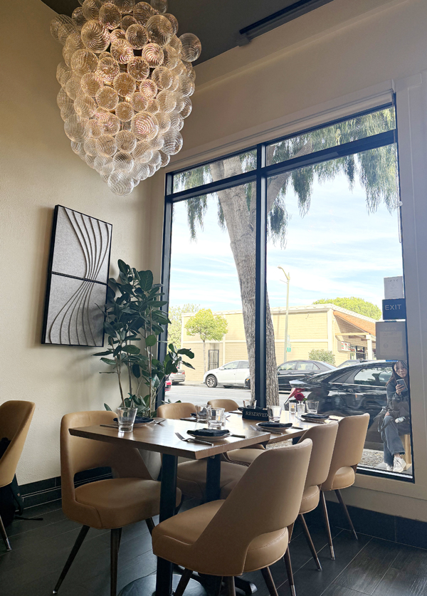 The snug, light-filled dining room.