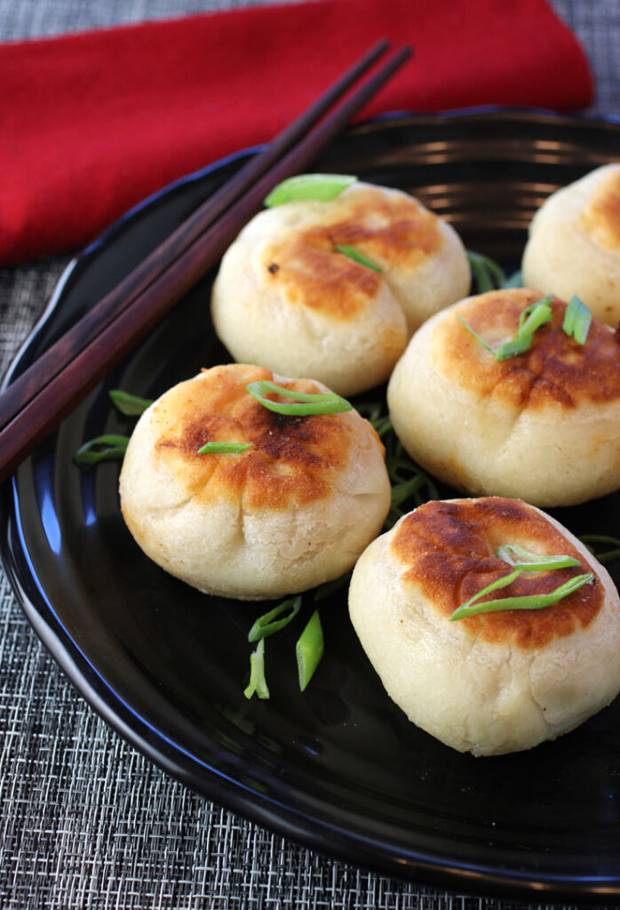 Crispy and chewy, sweet and spicy, these pan-fried mochi bao have so much deliciousness going on.
