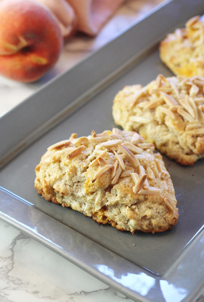 Juicy diced peaches and sweet pieces of almond paste make these scones a real summer treat.