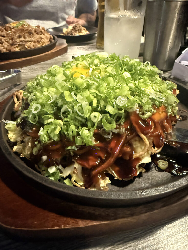 Negi pork okonomiyaki modanyaki-style at Fugetsu.