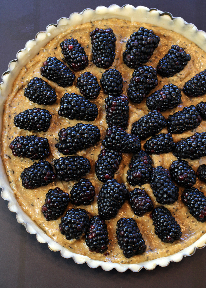 Arrange fresh blackberries on top, then slide into the oven.