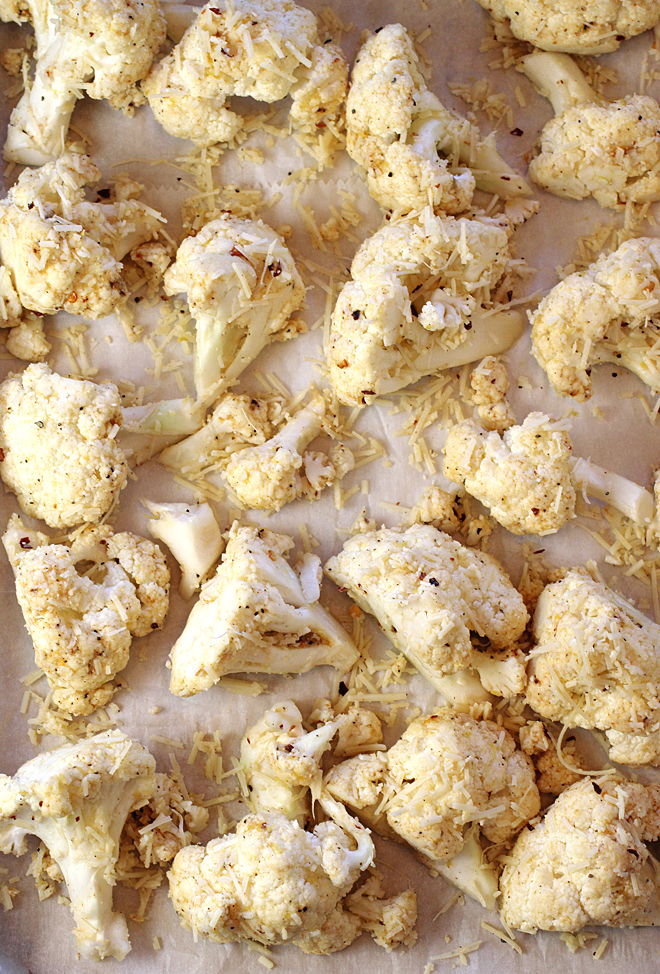 The coated florets ready to get baked in one layer on a sheet pan.