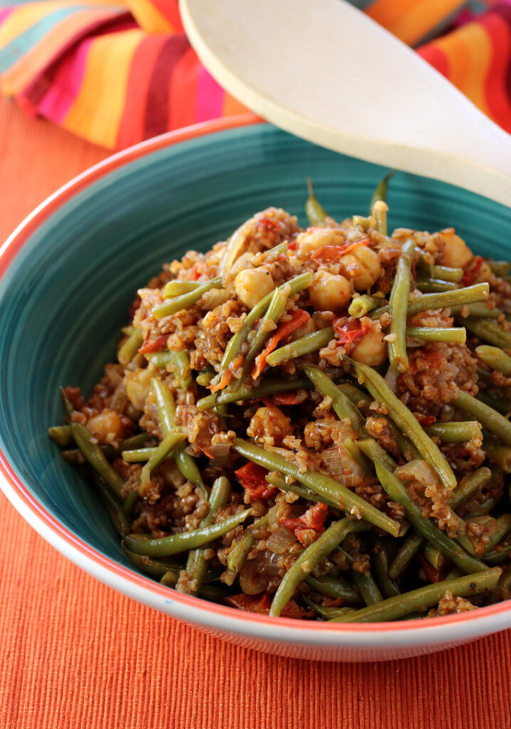The nuttiness of chickpeas, crisp-tender texture of green beans, and the sweetness of tomatoes combine for a sensational Lebanese dish.