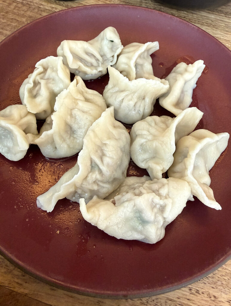 Pork-Wagyu beef dumplings, cooked and ready to eat, that my friend Charlen and I made in Eddie Lo's class.