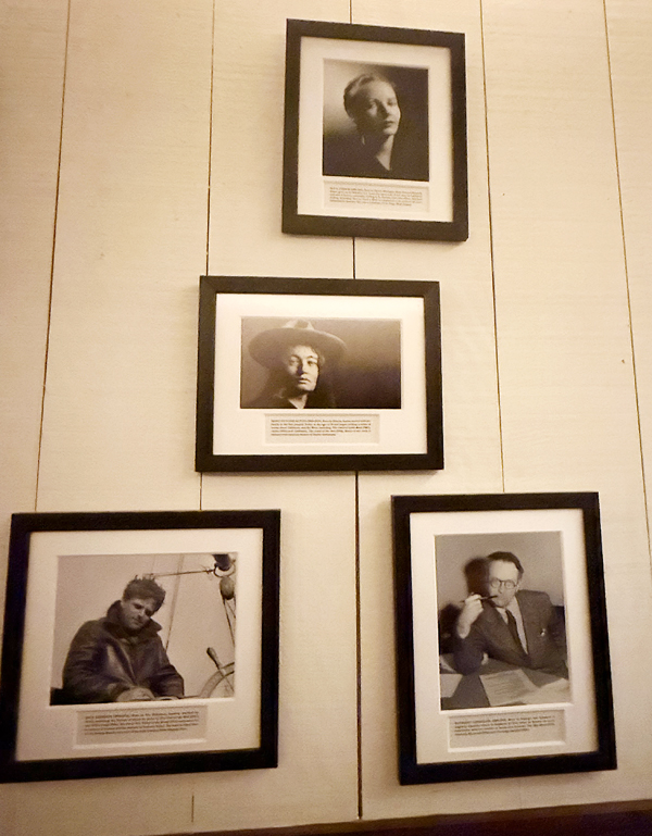 Framed photos of the favorite authors of the late Leslie Rudd, founder of Press, now overseen by his daughter Samantha Rudd.