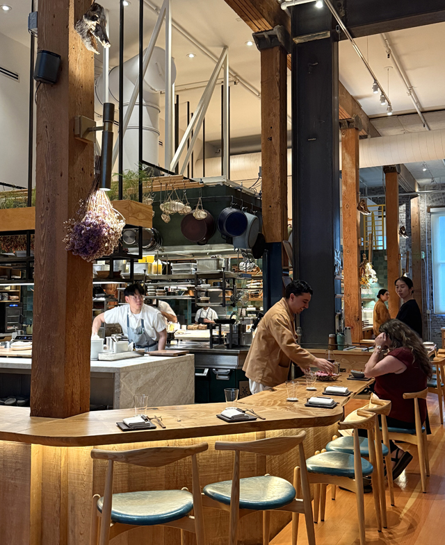 Choose chef's counter seating or tables just a few feet away from the open kitchen.